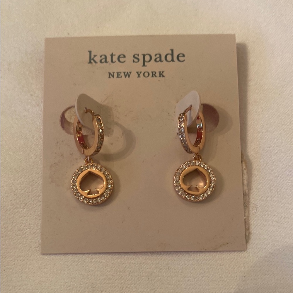 kate spade rose gold crystal spade drop earrings.
